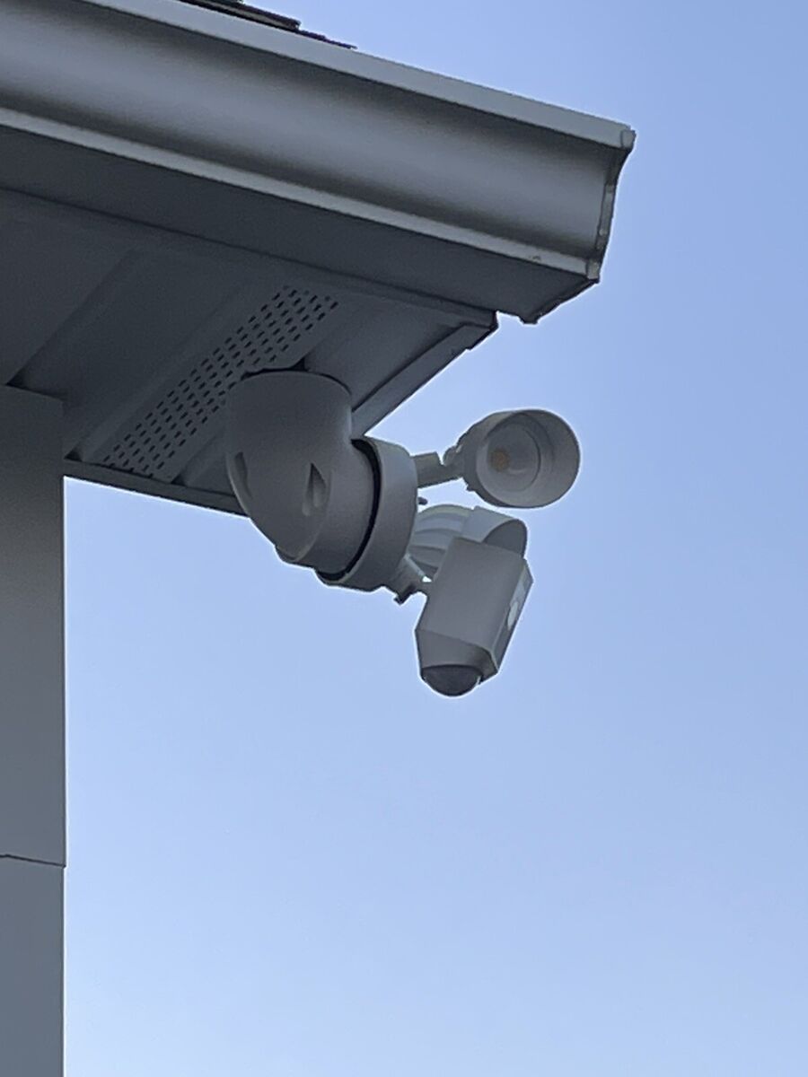 Ring Floodlight Cam installer London mounting and aligning the unit